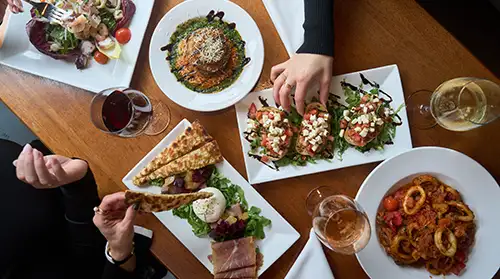 Happy Hour at Carmine's Coal Fired Pizza